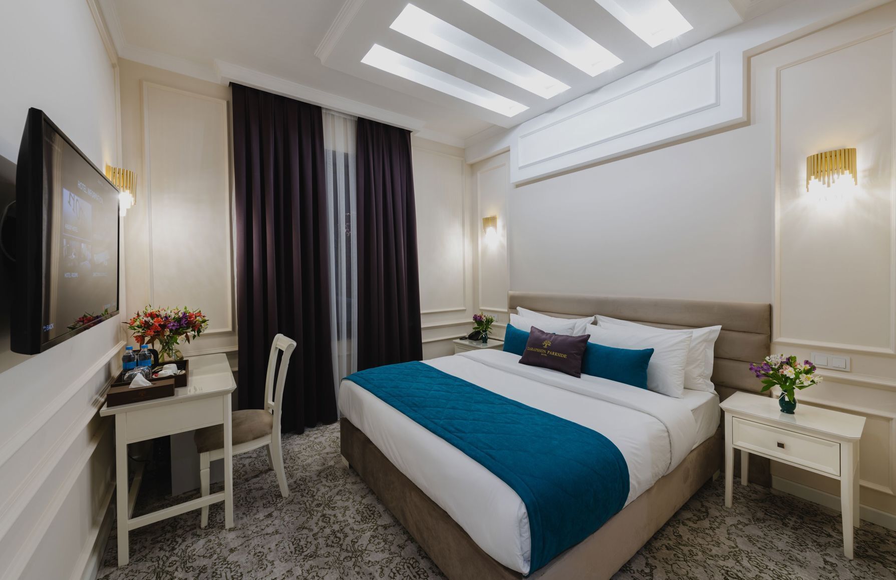 Premium bedding, down comforters, in-room safe, desk