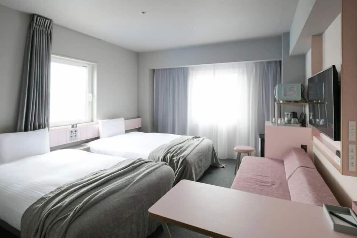 1 slaapkamer, donzen dekbedden, een laptopwerkplek