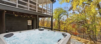 Woodsy Retreat with a Hot Tub and Seasonal Views!