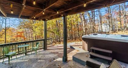 Woodsy Retreat with a Hot Tub and Seasonal Views!