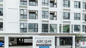 A multi-story building with a sign reading 'ABC@48 Ladprao-Suttisan.' - ABC@48 Hotel & Service Apartment (Bangkok)