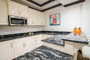 Main Deluxe Queen Junior Suite | Premium bedding, in-room safe, individually furnished, desk