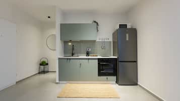City Apartment | Private kitchen | Full-size fridge, microwave, oven, espresso maker