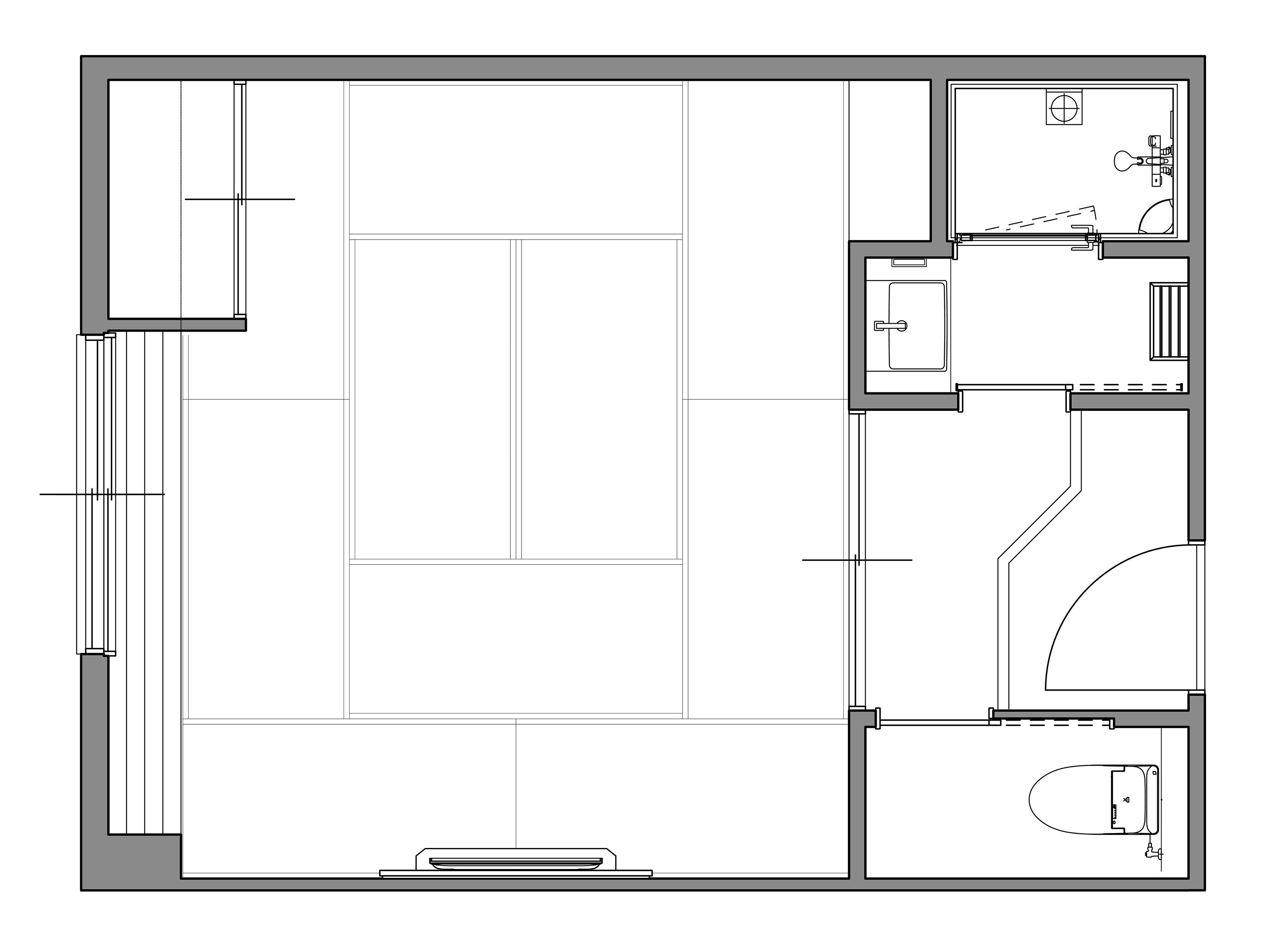 A floor plan with a large central open space, a kitchen area, a bathroom, and a small seating area.