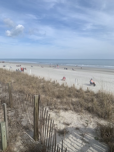 Beachfront 2-bedroom condo just steps away from sand, surf and sun.