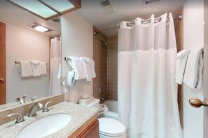 Combined shower/tub, towels, soap, toilet paper