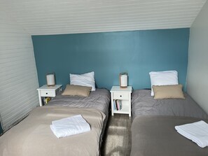 3 bedrooms, desk, iron/ironing board, travel cot