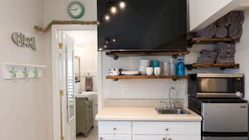 Fridge, microwave, coffee/tea maker, toaster