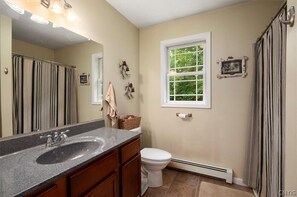 Baignoire, sèche-cheveux