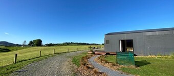 Self contained unit in a rural setting,  5 min to town and beach!