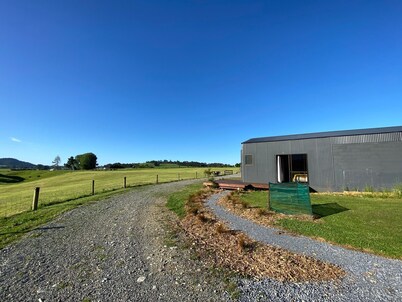 Self contained unit in a rural setting,  5 min to town and beach!