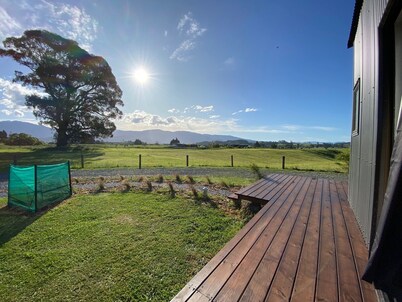 Self contained unit in a rural setting,  5 min to town and beach!