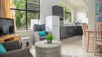 Panoramic House, 2 Bedrooms, Garden View, Beachfront | Living area | 43-inch LED TV with satellite channels, TV
