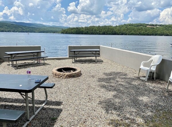 Outdoor dining - NEWLY RENOVATED! Cozy 2 bed 2 bath on Newfound Lake, private beach, scenic views (Plymouth)
