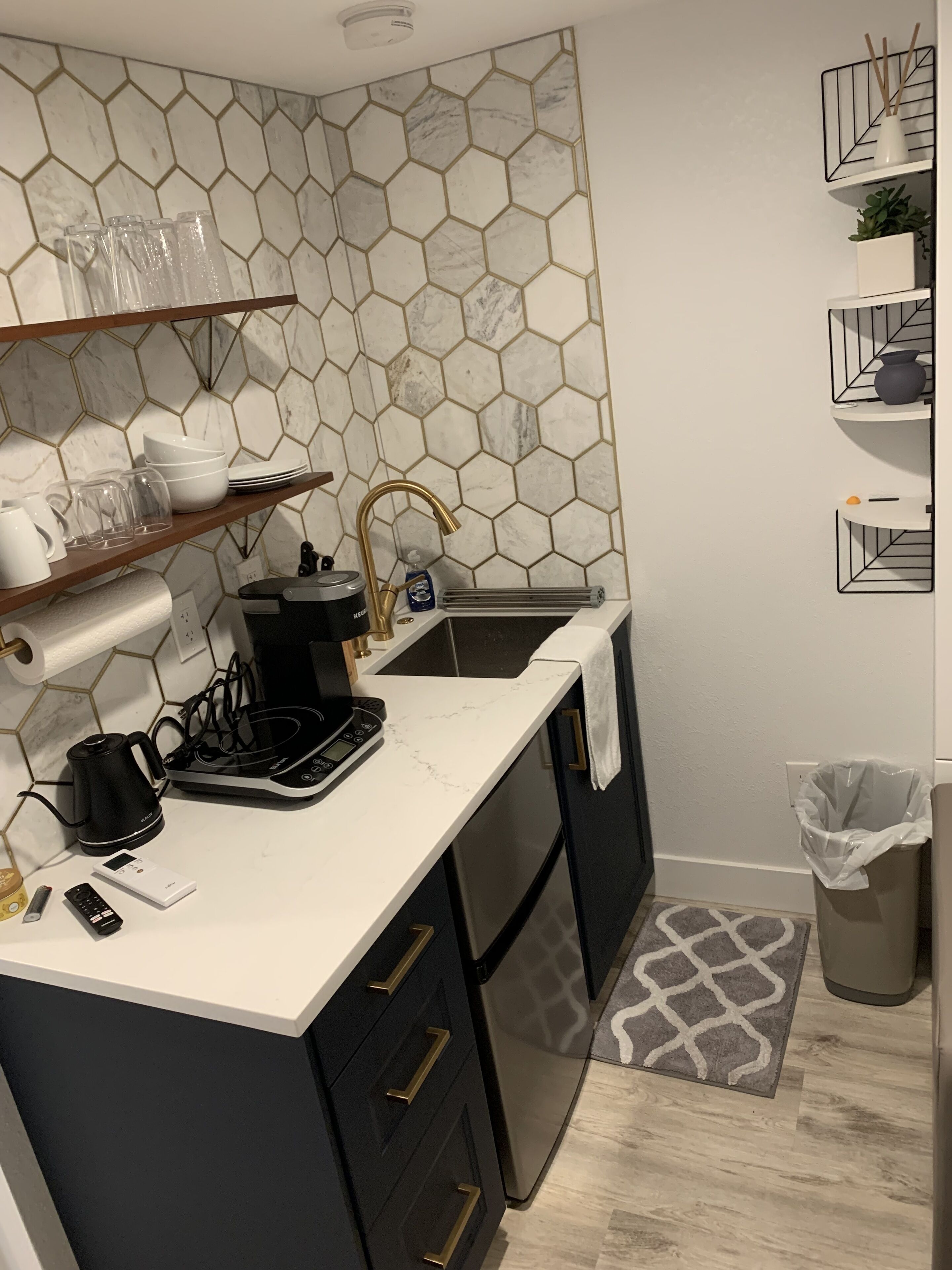 Fridge, coffee/tea maker, electric kettle, cookware/dishes/utensils