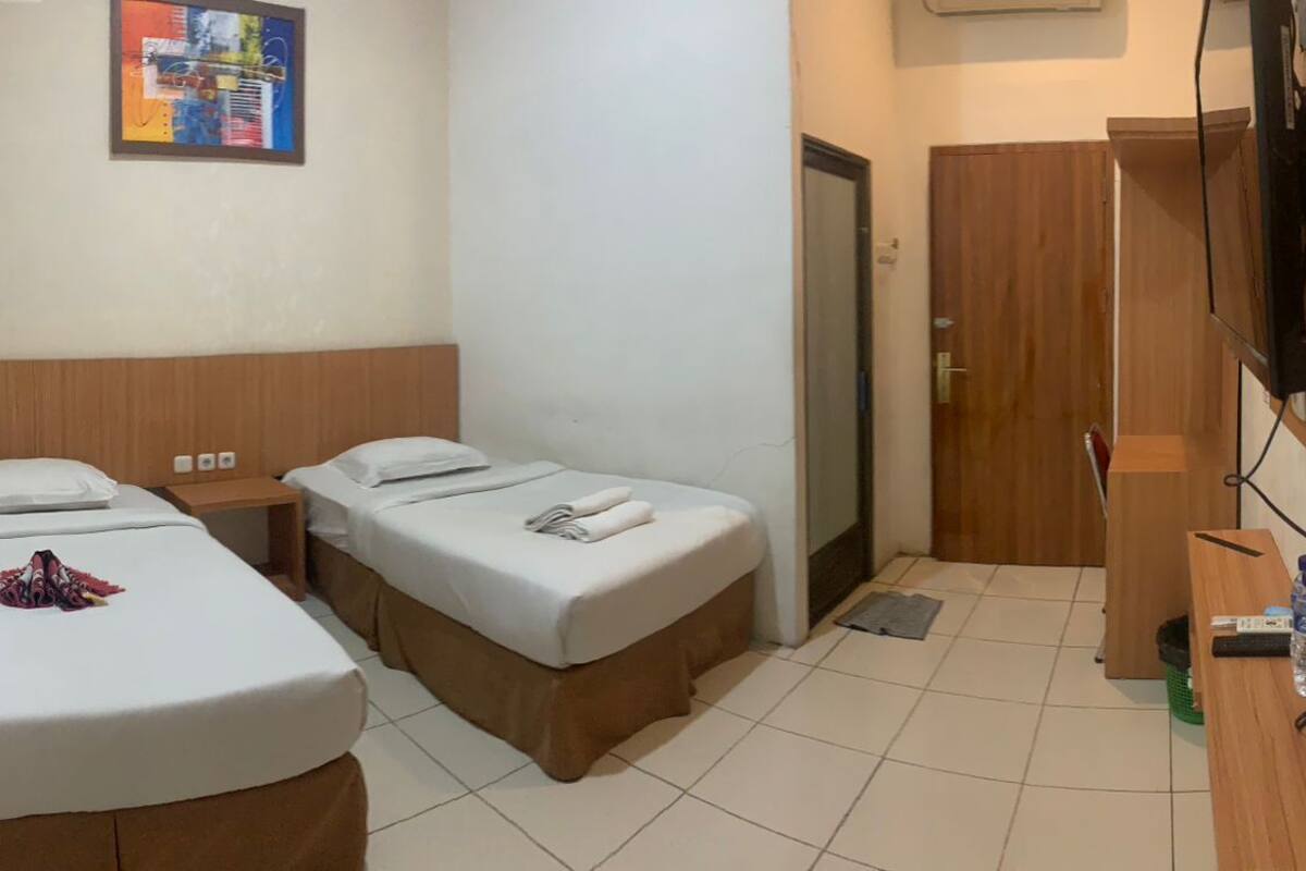 Kamar Double atau Twin Standar, Bebas Asap Rokok, pemandangan kota | Wi-Fi gratis
