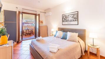 In-room safe, iron/ironing board, travel crib, bed sheets