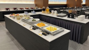 A buffet setup with various food items and beverages. - Haeundae Blue Story Hotel (Busan)