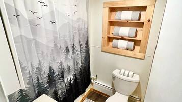 Combined shower/tub