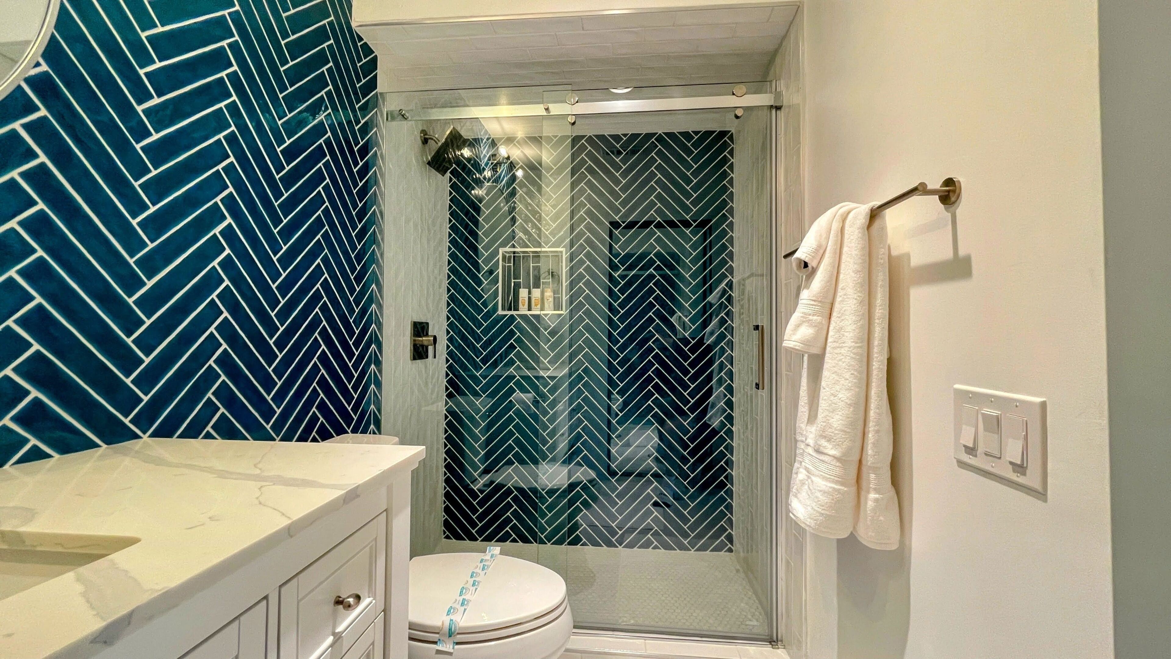 Shower, towels, soap, toilet paper