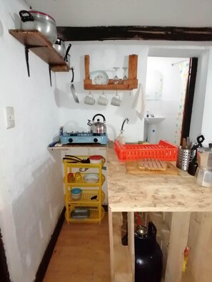 Fridge, coffee/tea maker, cookware/dishes/utensils