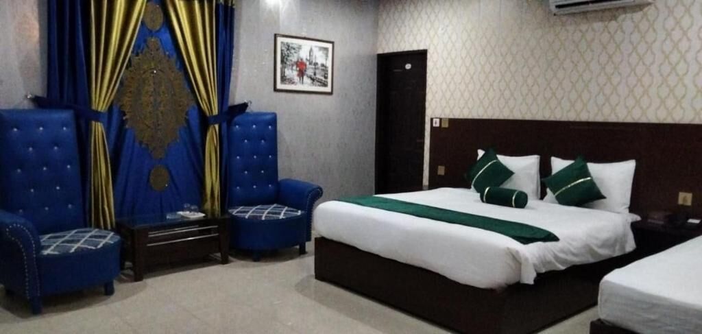 Family Room | Laptop workspace, iron/ironing board, bed sheets