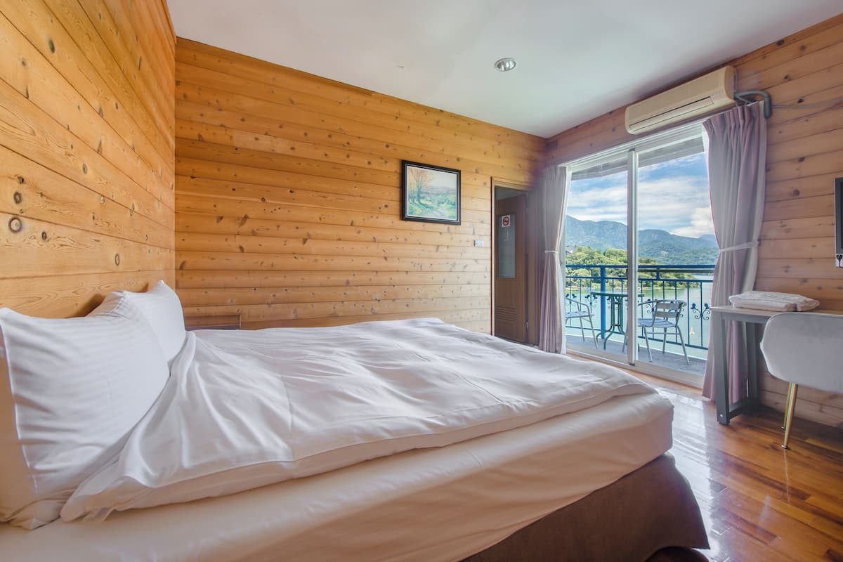 Habitación doble, vista al lago | Wifi gratis y ropa de cama