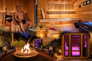 A sauna with wooden walls, a fire pit, and a bench.