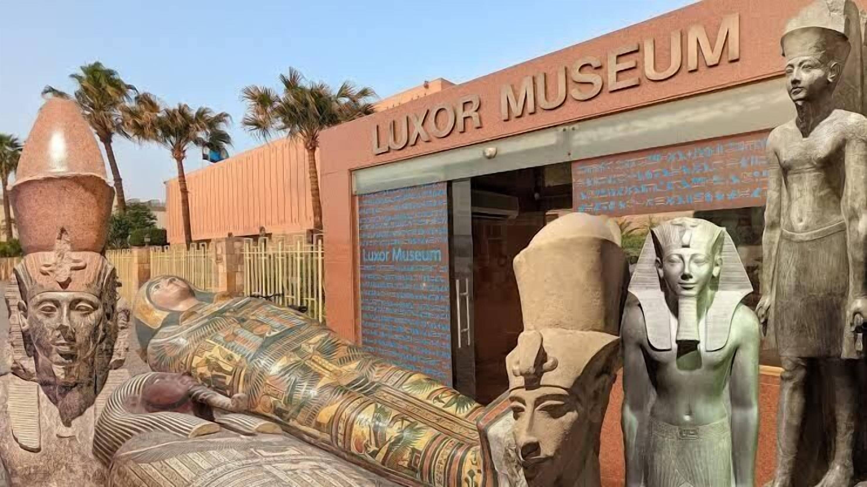 The Luxor Museum entrance with ancient Egyptian artifacts displayed outside.