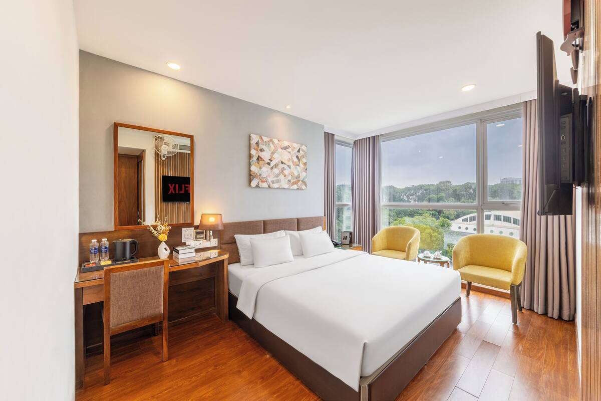 Kamar Double Deluks | Minibar, brankas, setrika/meja setrika, dan tempat tidur bayi