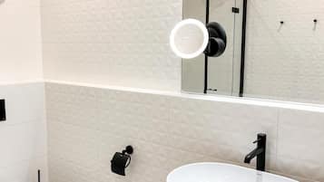 Comfort Apartment | Bathroom | Hair dryer, soap