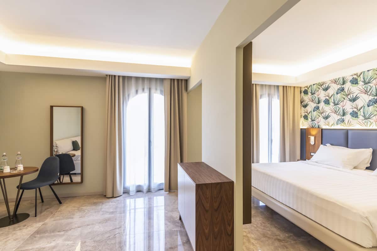 Basic Suite, 1 King Bed with Sofa bed, Balcony, Partial Sea View | 1 bedroom, premium bedding, down duvets, pillow-top beds