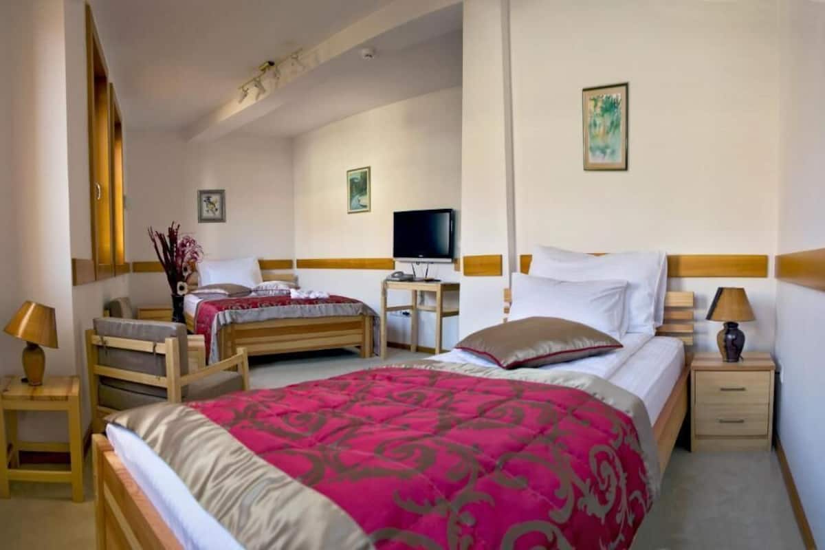 Comfort Triple Room | 1 bedroom, desk, laptop workspace, blackout drapes