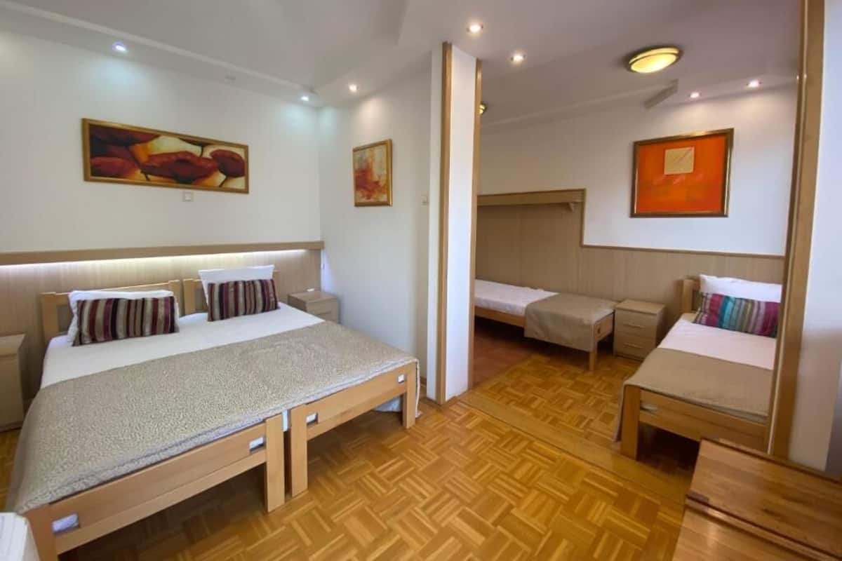 Comfort Quadruple Room, Terrace | 1 bedroom, desk, laptop workspace, blackout drapes