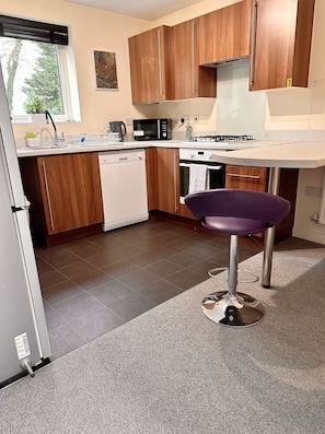 Apartment, Multiple Beds | Private kitchen