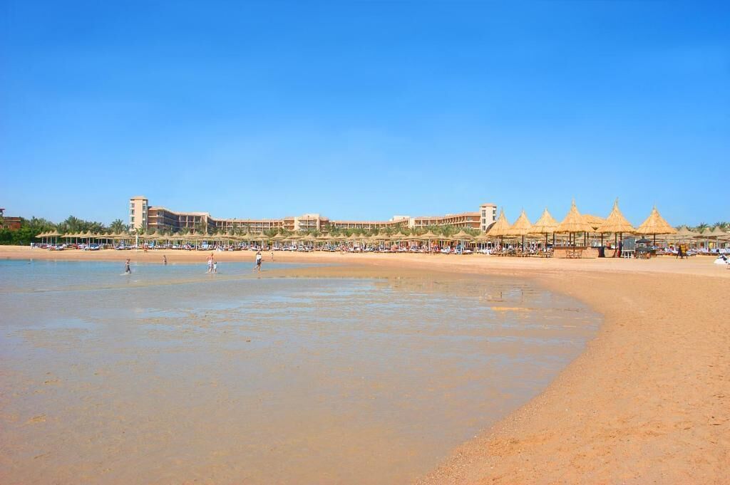 private beach, white sand, sun-loungers, beach umbrellas