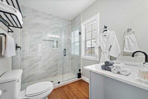 Hair dryer, towels, soap, shampoo