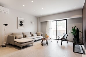 Deluxe Apartment | Living area | 43-inch Smart TV with digital channels, TV, Netflix - Marvelous 2BR Apartments with balcony (Athens)