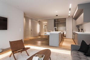 Deluxe Apartment | Living area | 43-inch Smart TV with digital channels, TV, Netflix
