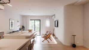 Apartamento Deluxe | Zona de estar