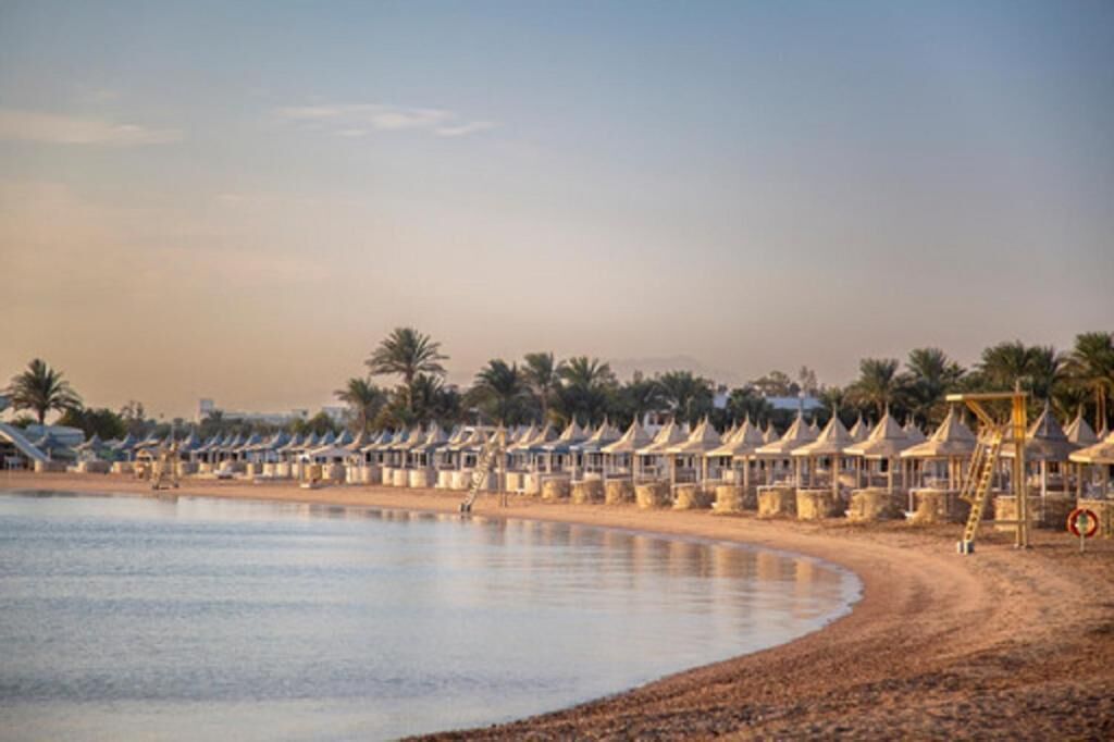 private beach, white sand, sun-loungers, beach umbrellas