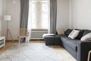 Superior Apartment | Living area | 36-inch TV with cable channels