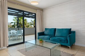 Classic Apartment | Living area | 56-inch flat-screen TV with cable channels, TV - Knightsbridge 108 (Cape Town)