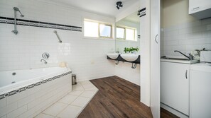 Combined shower/bathtub, hair dryer