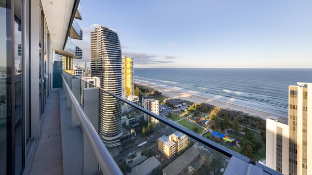 A high-rise building with a view of the beach and ocean. - ULTIQA Signature at Broadbeach (Broadbeach)
