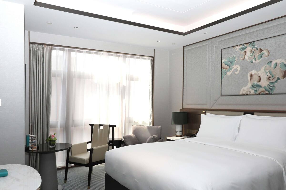 Premium bedding, down comforters, Select Comfort beds, minibar