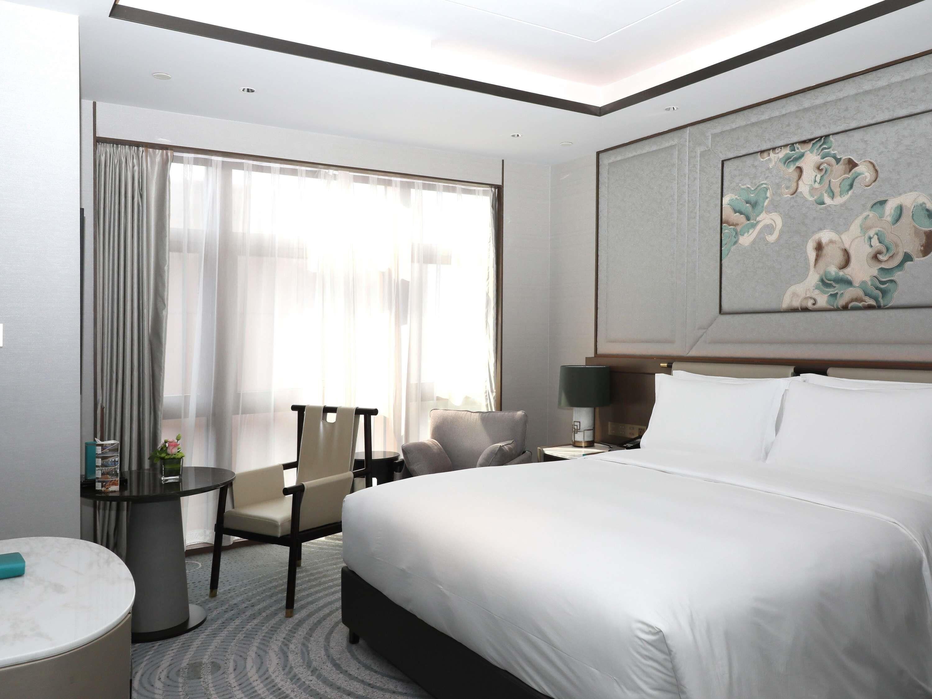 Premium bedding, down comforters, Select Comfort beds, minibar