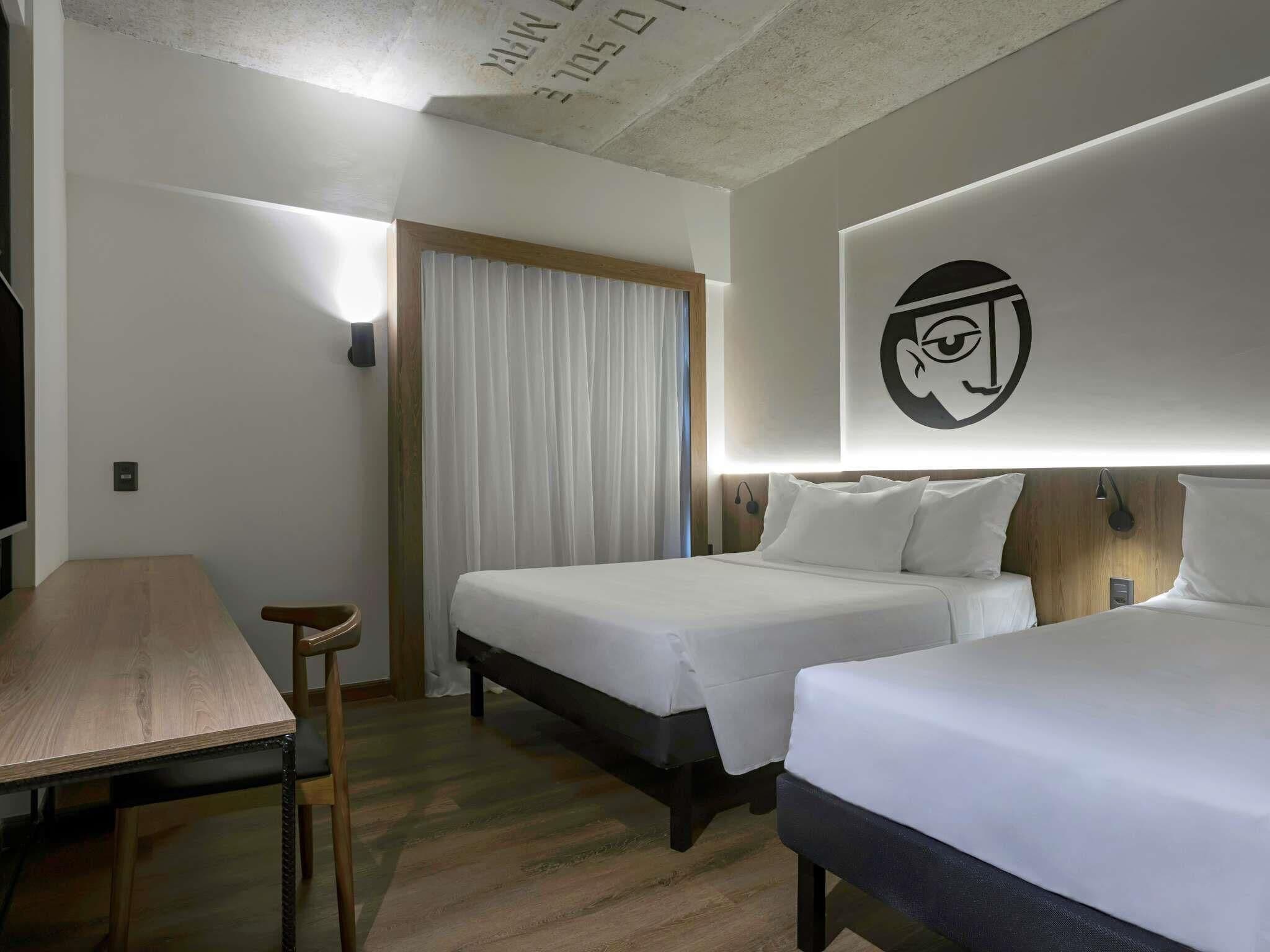 Standard Room with 1 double bed and 1 single bed | Minibar, in-room safe, blackout drapes, free WiFi