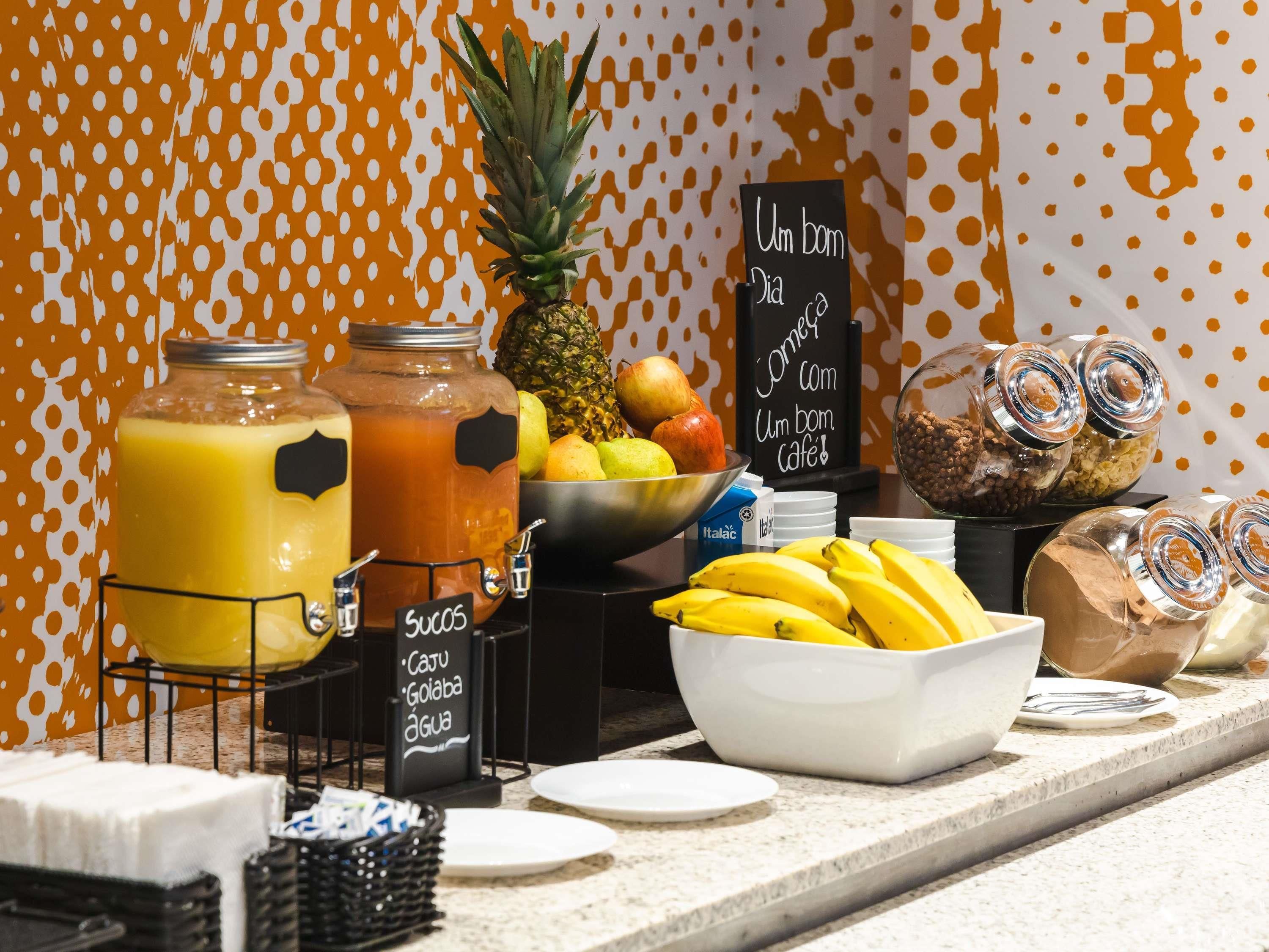 A breakfast buffet with various food items and beverages.