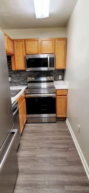 Enjoy cooking in this well-equipped kitchen with an oven, microwave, and ample storage.